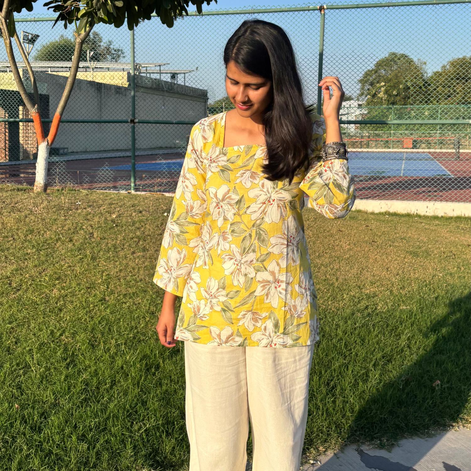 Pure Cotton Full Sleeves Yellow Floral Printed Short Kurti With Back Zig Zag Dori