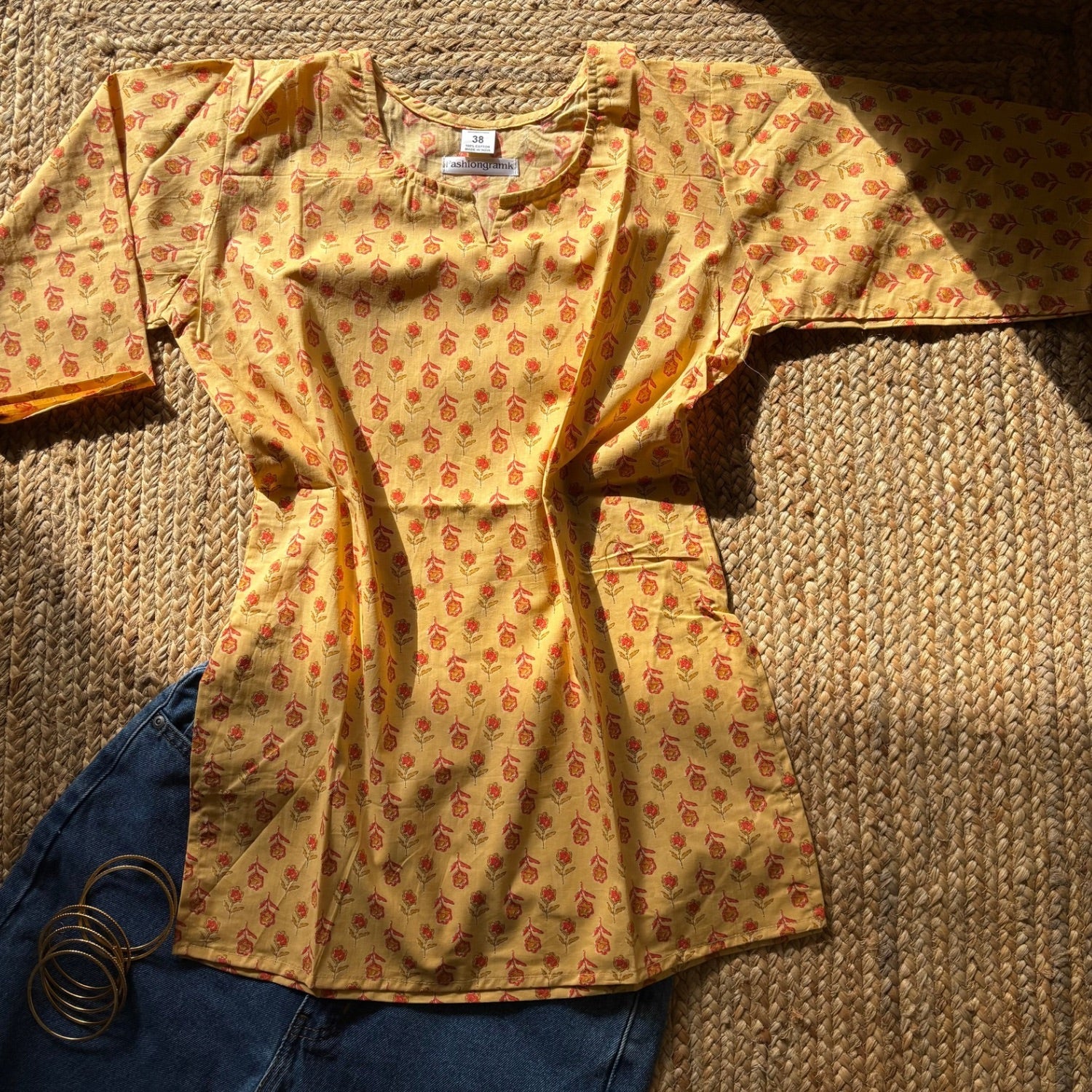 Yellow Color Pure Cotton 3/4th Sleeves Printed Short Kurti For Women